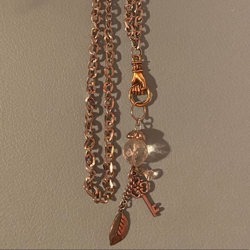 Long vintage-style charm necklace